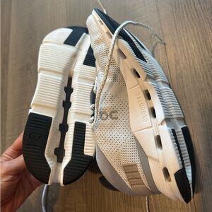 On Running Gray and White Sneakers